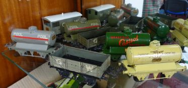 Hornby gauge 0 tinplate pre-war and post-war wagons, four petrol tank wagons: ‘BP’, ‘Castrol’, pre-