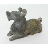 A Chinese antique carving of a winged mythical beast, height 7cm.
