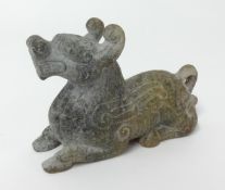 A Chinese antique carving of a winged mythical beast, height 7cm.