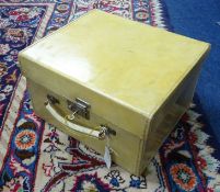 A calf skin vintage vanity case with key.