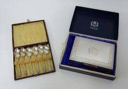 A set of six 1935 silver jubilee tea spoons cased together with a QEII 1970 jubilee EPNS cigarette
