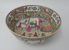 A canton famille rose punch bowl with six character marks, diameter 30cm.
