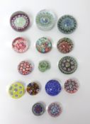 A collection of 15 paperweights including Millefiori.