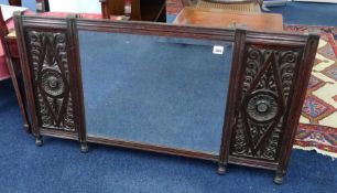 A carved oak and panelled mirror and a set of open bookshelves (2).