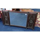 A carved oak and panelled mirror and a set of open bookshelves (2).