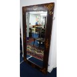 A large 19th century rectangular wall mirror with marquetry inlay.