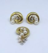 A matching set comprising- a pair of 18ct yellow gold swirl design cultured pearl and eight cut