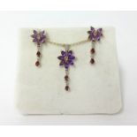 An amethyst, ruby and diamond set of jewellery, total weight 7.9gms.