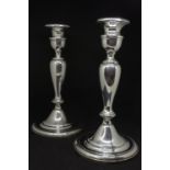 A pair American silver filled candle sticks, marked 'sterling silver'