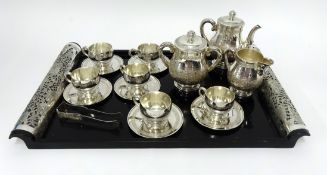 Vietnamese silver tea/coffee set comprising six cups and saucers, sugar pot, cream pot, tongs and