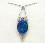 An antique opal and diamond drop pendant white gold setting, with centre large black opal approx.