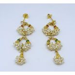 A pair of 18ct yellow gold freshwater pearl drop earrings, each comprising 3 sections of 'ricicle'