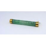 A Chinese marked jade brooch, length 50mm.