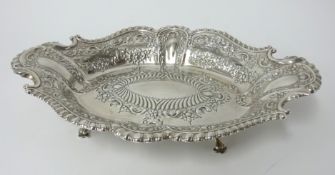 A Victorian silver oval dish with embossed sides, maker HA, Sheffield 1889, approx. 14.45oz.