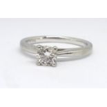 A Brilliant Fire platinum diamond solitaire ring, with IGI certificate indicating 0.40 carat