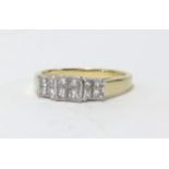 An 18ct diamond ring set with 12 princess cut diamonds, marked '0.33carat', size L.