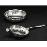 A Geo V silver bowl by Deakin & Francis, Birmingham, 1923 also a silver tea strainer, approx. 2.
