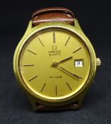 An Omega, a gents quartz De-Ville date wristwatch.