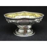 A Victorian silver oval dish with beaded borders, maker AP, London 1864, approx. 2.11oz.
