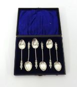 A set of George V silver apostle spoons cased.