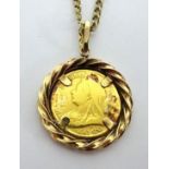 A Victoria 1893 half sovereign set on a 9ct gold chain, total weight 11.20g.