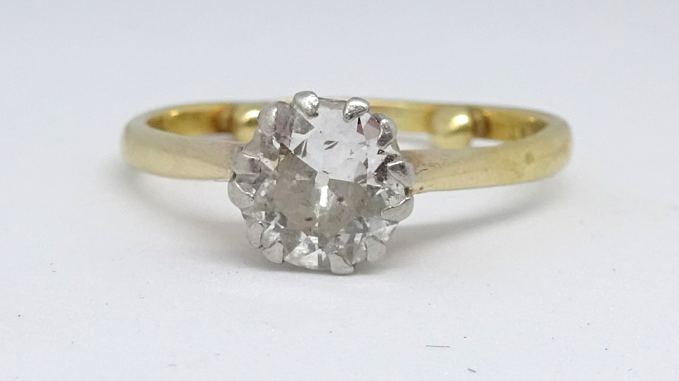 An 18ct diamond solitaire ring, approx. 1.50 carat, size O.