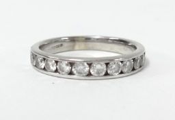 A 9ct diamond and half band eternity ring with ten round brilliant cut diamonds, weight approx. 0.