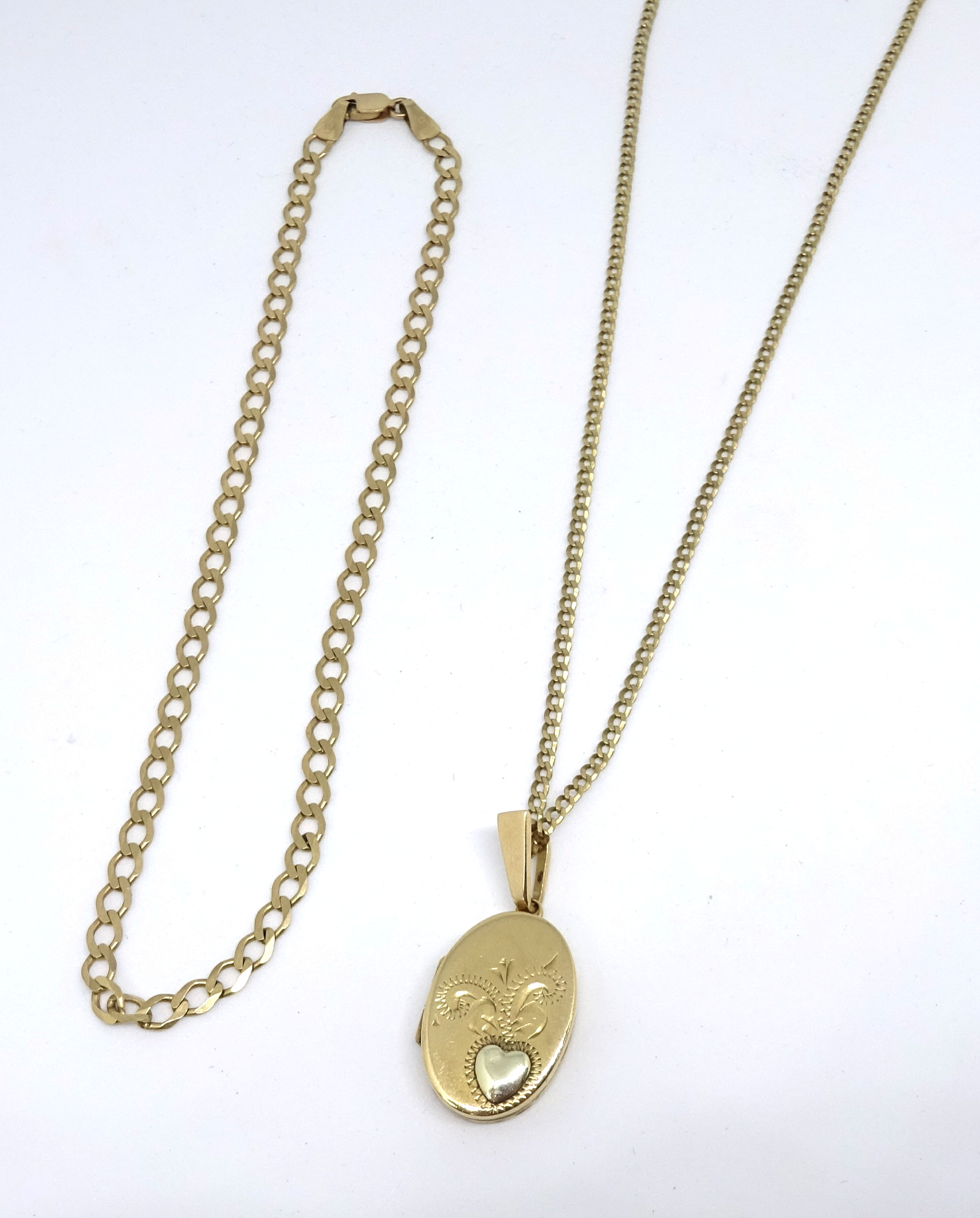 A 9ct gold locket and chain together with a 9ct gold bracelet, total weight 8.3g.