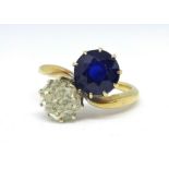 A sapphire and diamond crossover ring, diamond approx. 1.50 carats, size M.