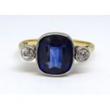 A large sapphire and diamond set ring, size U.