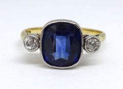 A large sapphire and diamond set ring, size U.