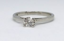 A platinum a diamond solitaire ring, size N.