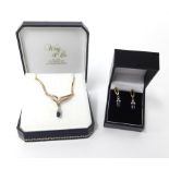 A 9ct gold sapphire and diamond collar and earring set, total weight 9.9gms.