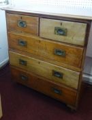 A faded mahogany military chest in two sections, with recess branch handles, width 91cm.