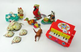 A collection of seven tin plate toys including Chinese clock work Panda Drummer (7).