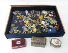 A collection of various dress brooches and three small jewellery boxes.