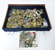A large collection of various dress brooches.