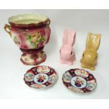 A pair of Japanese Imari scallop dishes, two Sylvac bunnies and a reproduction Jardinière.