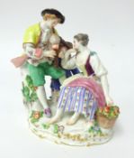 An early 20th century Meissen porcelain group, modelled as 'Two Lovers, and Attendant' , incised