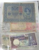 An interesting album of old bank notes including, Krone, Costa Rican, Chinese, early Bank of England