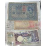 An interesting album of old bank notes including, Krone, Costa Rican, Chinese, early Bank of England