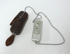 A micro pocket camera by Minox, marked Wetzler, in leather case.
