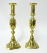 A pair of brass candlesticks early 20th century, height 30cm.