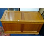 A 20th century blanket chest with brass handles.