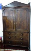 An early 19th century mahogany linen press, as found.