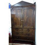 An early 19th century mahogany linen press, as found.