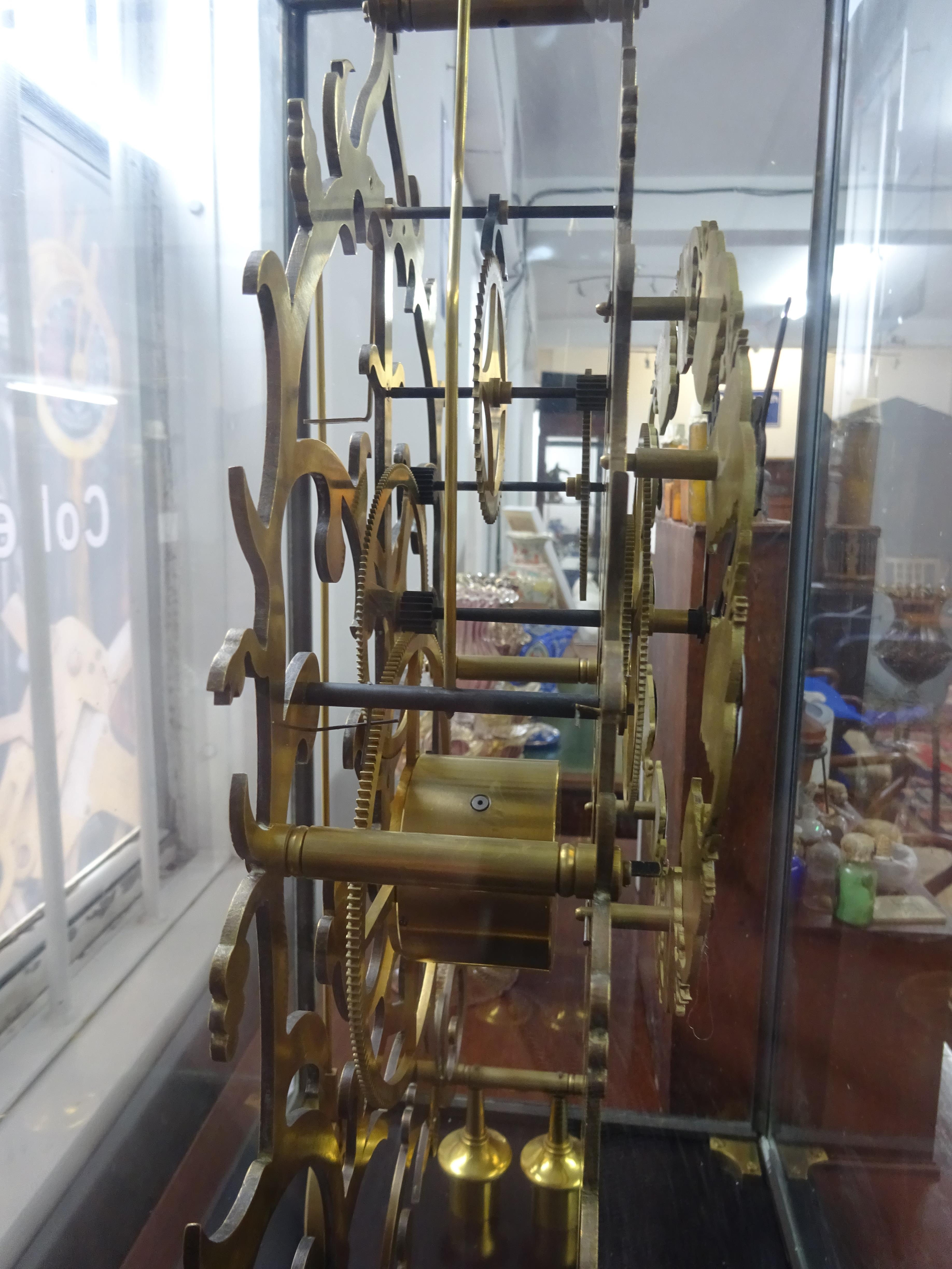 A large skeleton clock with cartouche enamel dial with roman numerals, bell strike, housed in a - Image 6 of 6