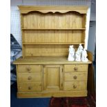 A 19th century pine dresser, with a later top shelf unit, width 168cm.