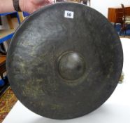 A bronze Tibetan style temple 'nipple' gong, diameter 44cm.