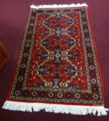 A 20th century Azerbaijan rug, 158cm x 100cm.